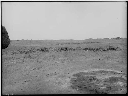 Remains of house foundations near the northeast wall of the Tschudi group