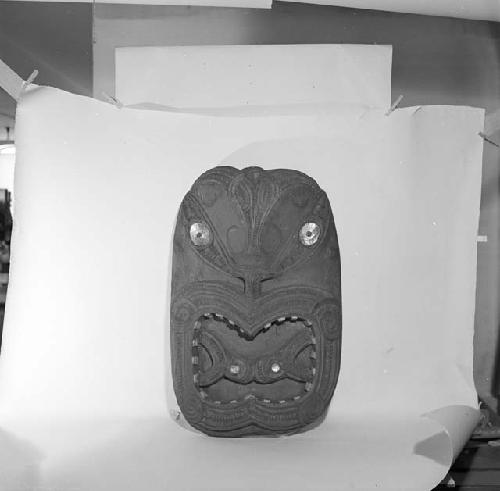 Large carved wooden head used at top of entrance of the meetinghouse