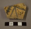 Decorated corrugated potsherd