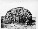 Kickapoo Indian lodge of elm bark, erected in St. Louis, 1904