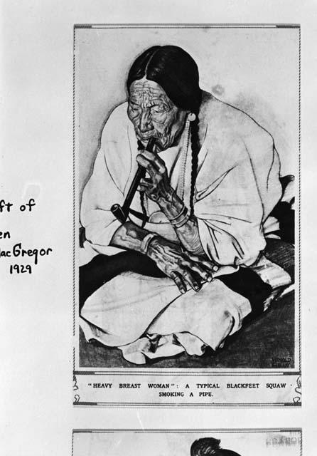 Blackfeet woman smoking a pipe