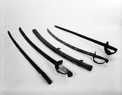 Four historical swords and one sheath