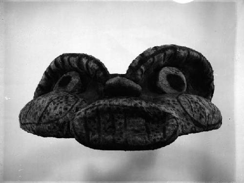 Head-piece in form of animal head covered with painted bark cloth