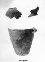 Medium-sized broken pottery vessel and 2 sherds