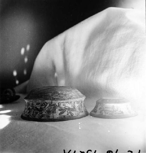 Two similar polychrome bowls