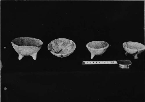 Four small tripod bowls from Structure R86; Burial Cist II