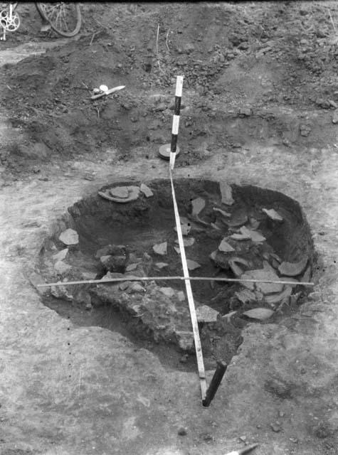 Pit excavation with sherds exposed