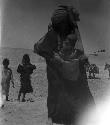Shammar Bedouin at Jumaima, woman and children