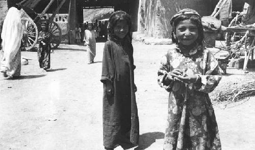 Woman and close-up of two little girls