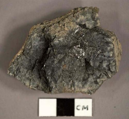 Possible charcoal/slag?