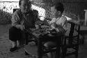 Yutaoho, Shansi, June 1935, David, Su nai-nai, at lunch on veranda