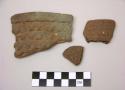 Bundle containing fragments of pottery - primitive