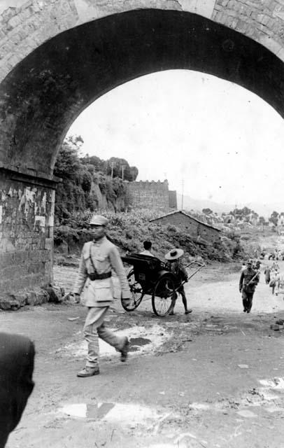 People going through an archway