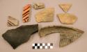Ceramic, rim and body sherds, some black paint on red or white, some incised