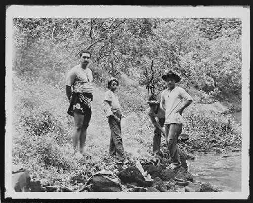 Men in jungle landscape