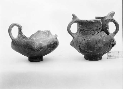 Two broken pottery vessels from grave 3 exacavation