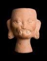 Earthenware goblet in the form of a snarling deity head