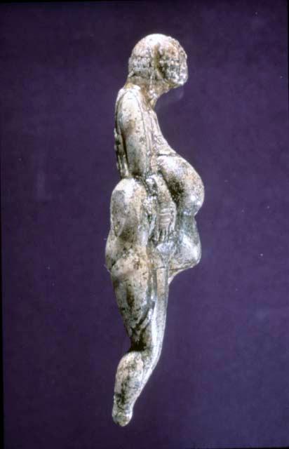 Ivory female figurine, profile view