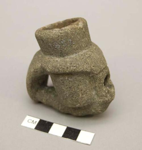 Stone pipe; bowl depicts a raven's beak.