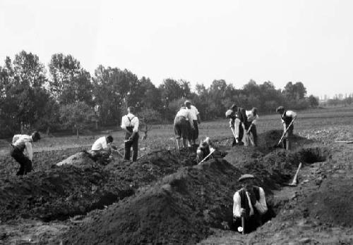 Men digging initial sounding trenches