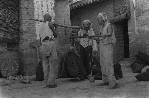 Yutaoho, Shansi, summer 1935, weighing grain at a Yutaoho mill