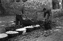 Preparing food (macaroni) for pilgrims