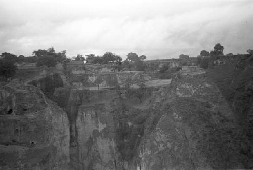 Steep hills with caves