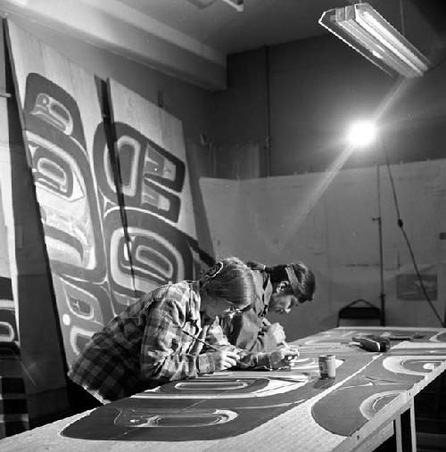 Nathan Jackson and Dorica Jackson at work, carving wood