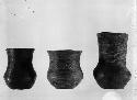 Casts - three corded pottery vessels
