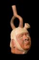 Pottery vessel, human head