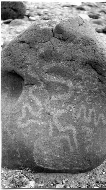 Lava rock pictograph, Fruita. Black boulders found near open sites.