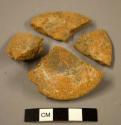 7 potsherds - pieced together into a small vessel