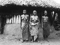 Three women of varying ages, center woman is head medicine woman