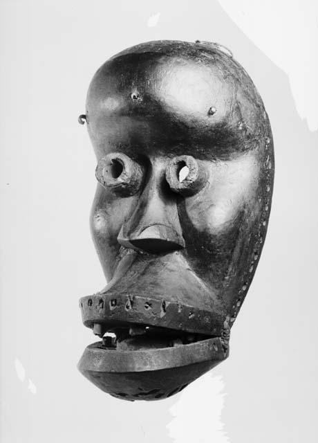 Wooden mask, property of George Harley