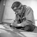 Nathan Jackson at work, carving wood