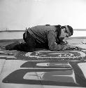 Nathan Jackson at work, carving wood