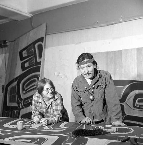 Nathan Jackson and Dorica Jackson at work, carving wood