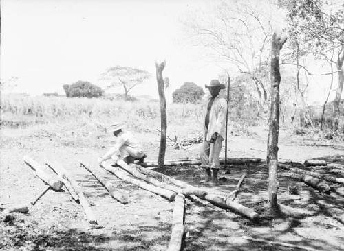 House building 2, placing the corner posts in position
