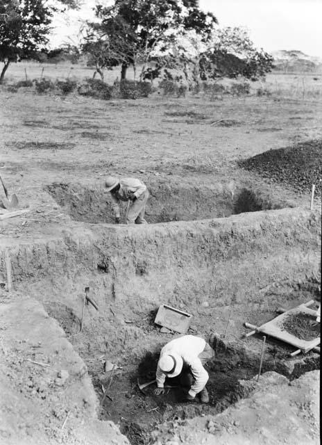 Excavation 1-31, looking southeast showing work on grave under Grave A