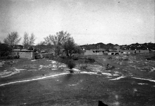 Oasis of the third stage caption, view of village from a distance