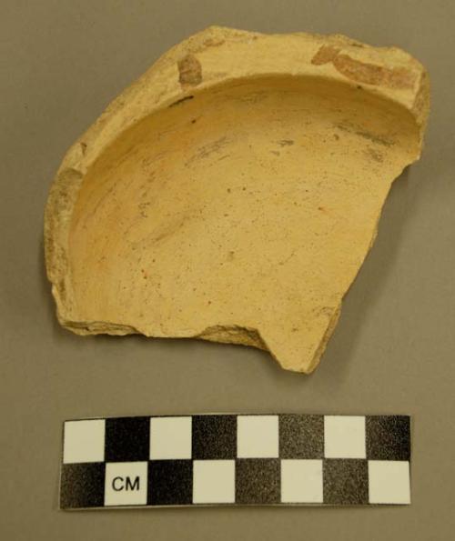 Part of San Bernardino black-on-yellow pottery bowl