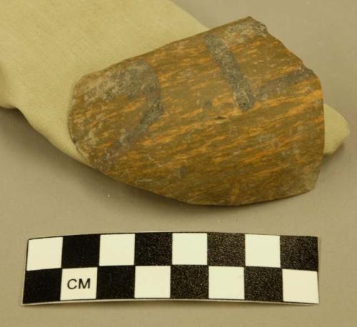 Part of small San Bernardino black-on-yellow pottery bowl