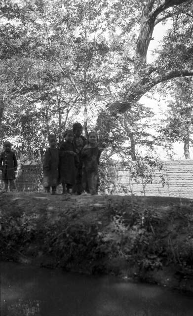 Children in Turfan, three girls and two boys