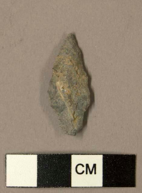 Chipped stone projectile point, stemmed, flat one side