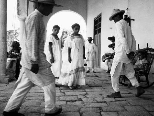 Indian men and women in common dress