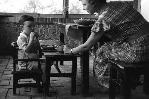 Yutaoho, Shansi, June 1935, Eleanor leaning over to David at lunch