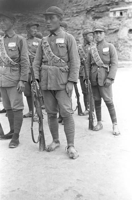 Group of soldiers standing at ease