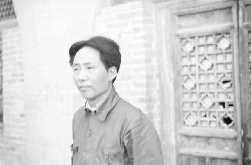 Portrait of Mao Zedong. Wall in background