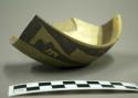 Part of jeddito black-on-yellow pottery bowl