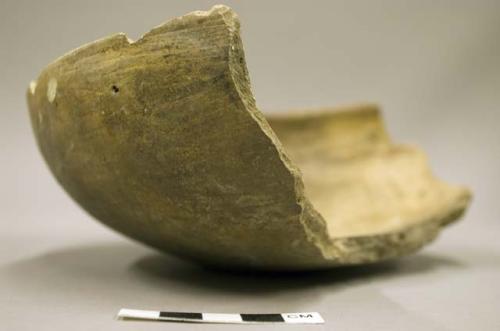 Sherds of one half a plain pottery bowl